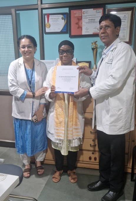Dr Adenrele With Certificate