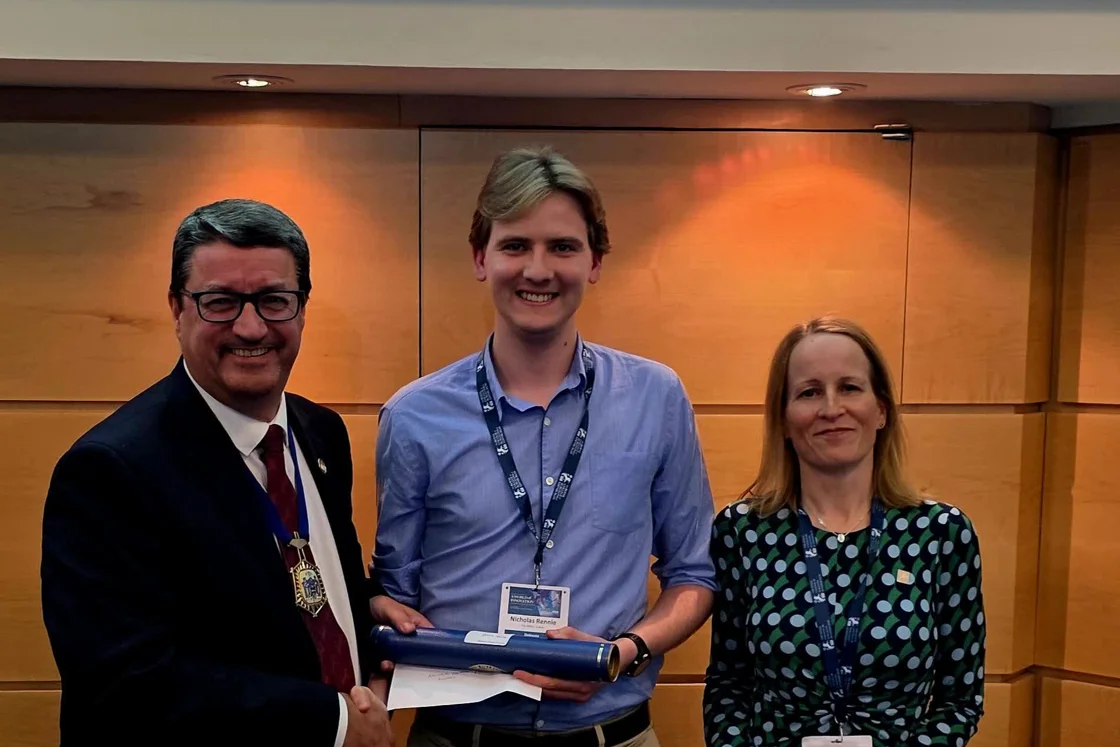 Winner of the Triennial Poster Presentation, Nicholas Rennie Winner of the Triennial Poster Presentation, Nicholas Rennie