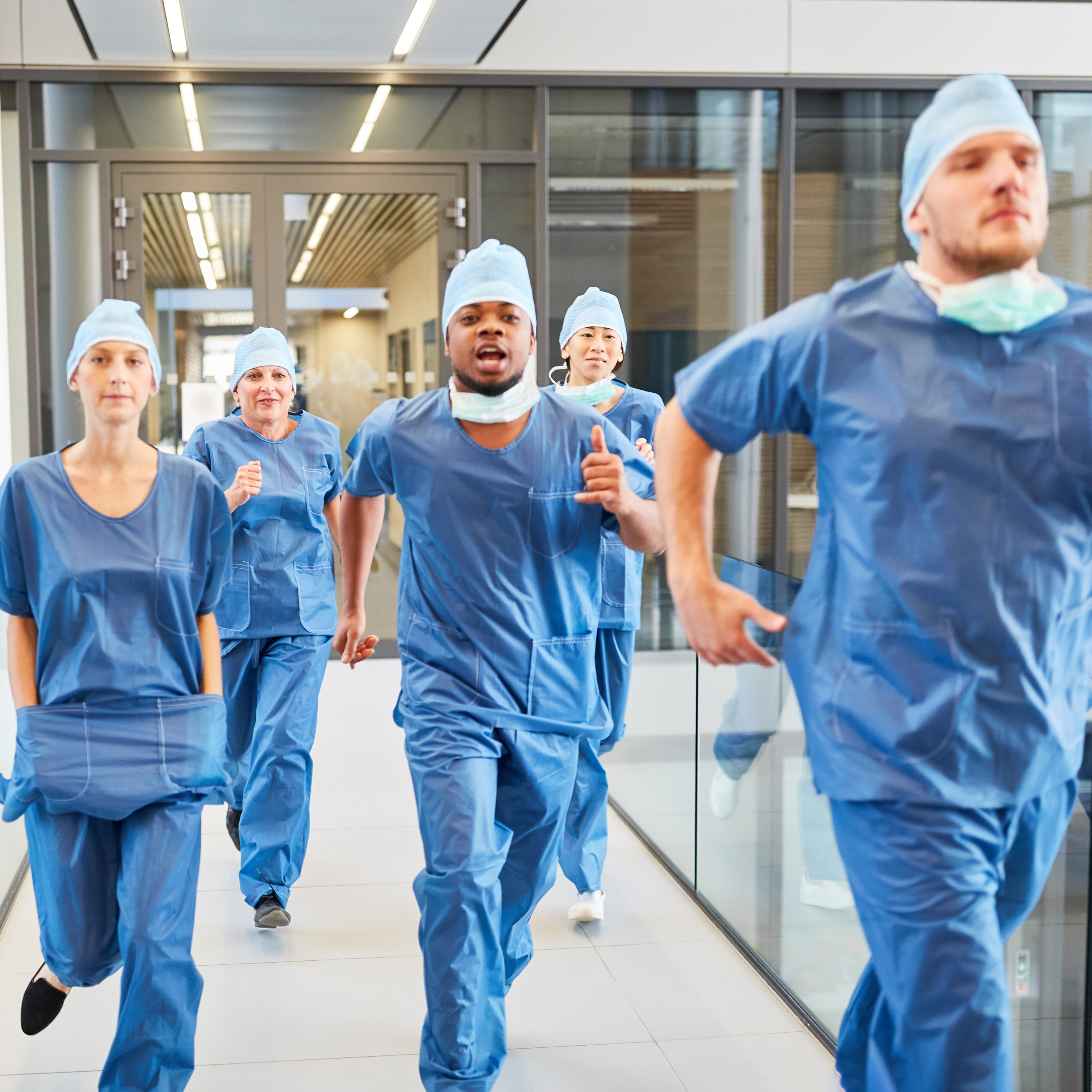 Surgeons Running in Hospital