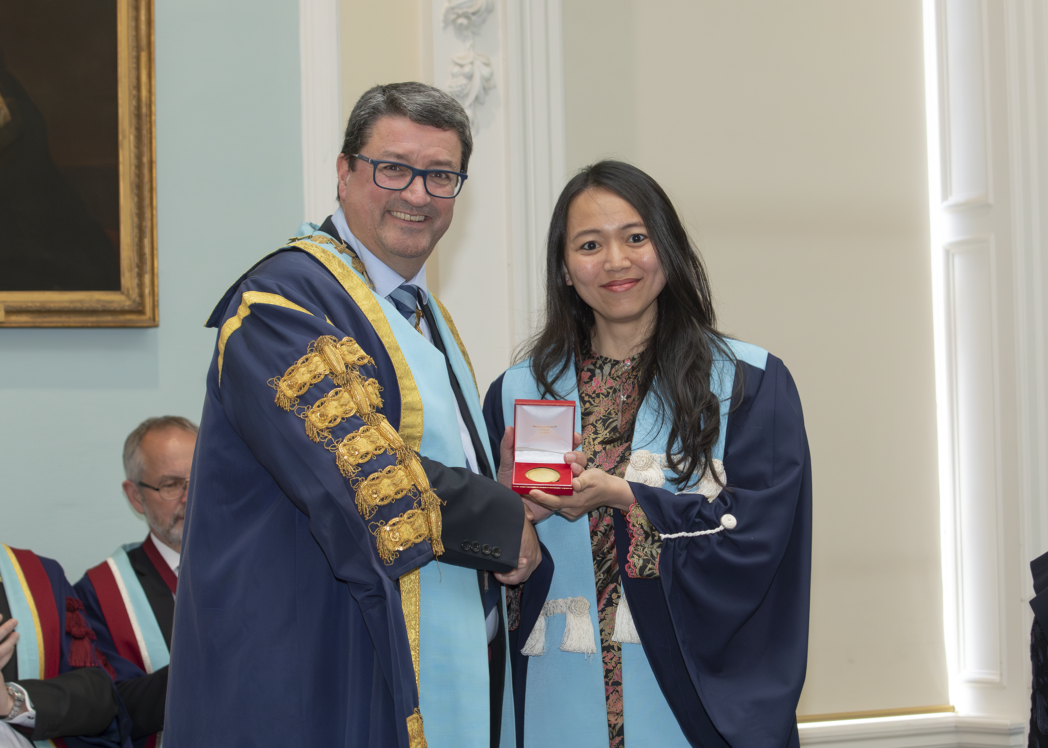 A diplomate in Edinburgh receiving a medal 2024
