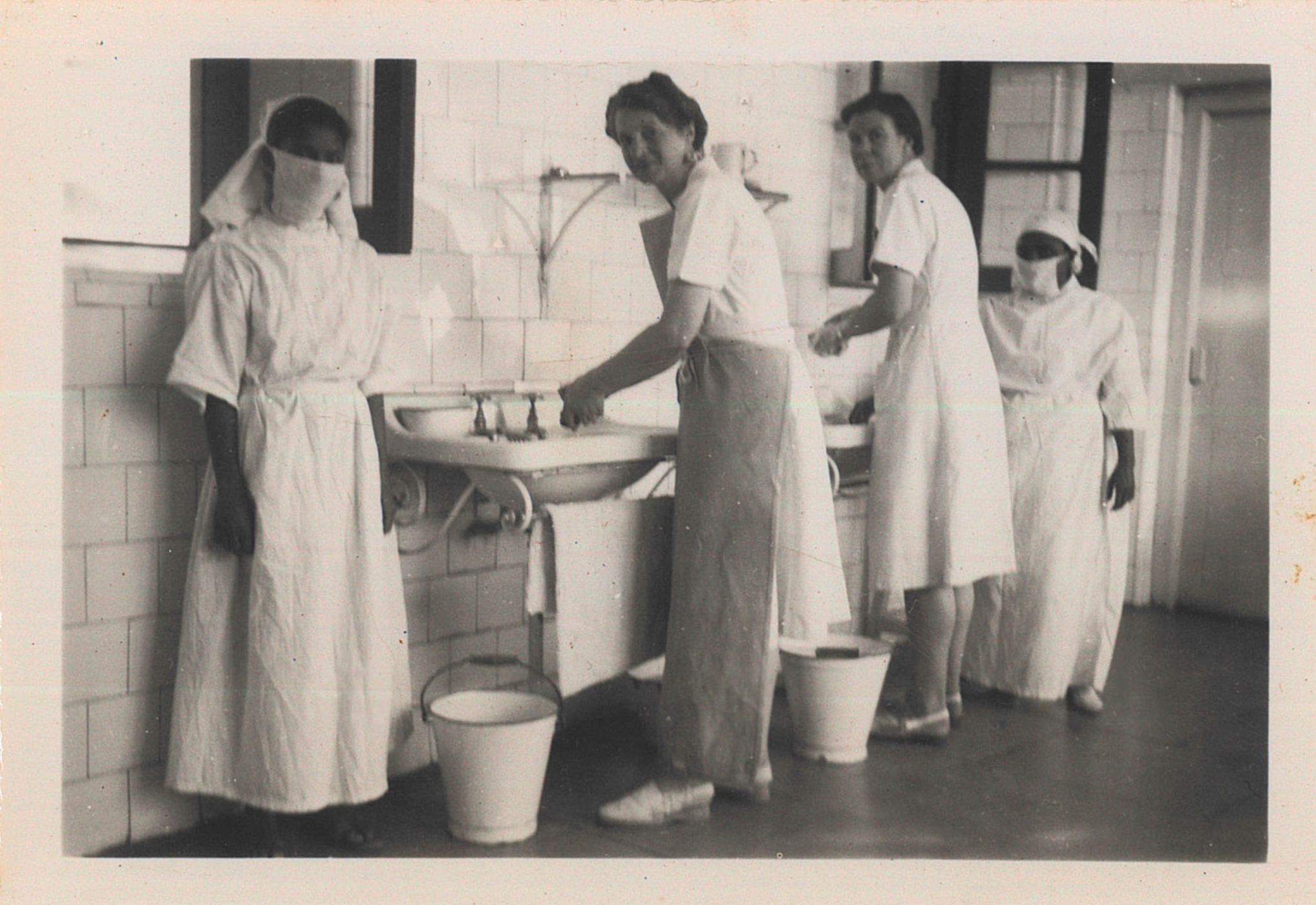 Scrubbing Up for Operation (McMillan Family Archive)